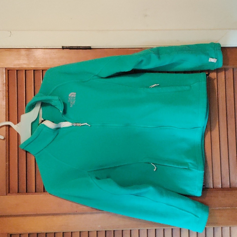 The North Face woman size medium green fleece jacket